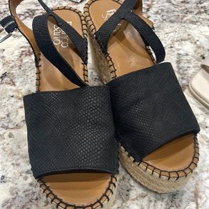 Gently worn  all around shoe /black sandals with wedge heel